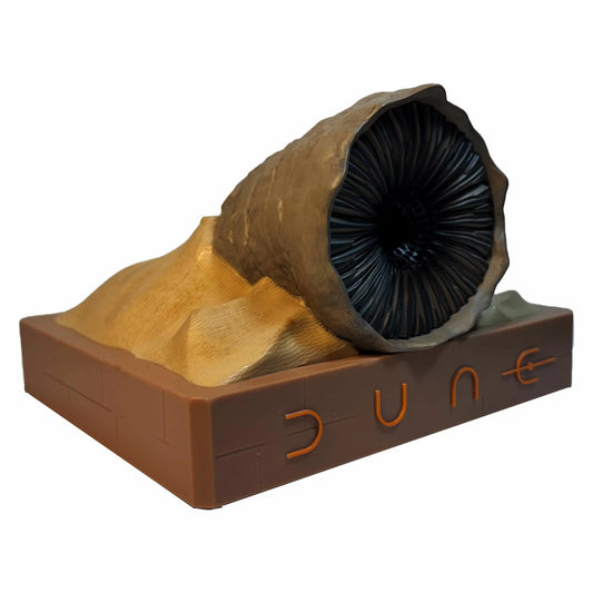 Textured limestone base supporting a detailed Shai-Hulud sandworm figurine with an integrated Bluetooth speaker-0
