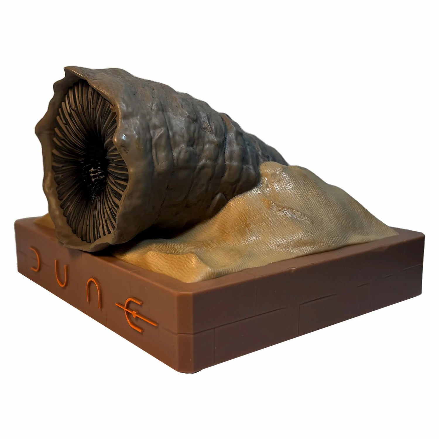 Side profile view highlighting the coiled shape and textured skin of the sandworm collectible speaker