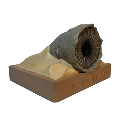 Textured limestone base supporting a detailed Shai-Hulud sandworm figurine with an integrated Bluetooth speaker-10