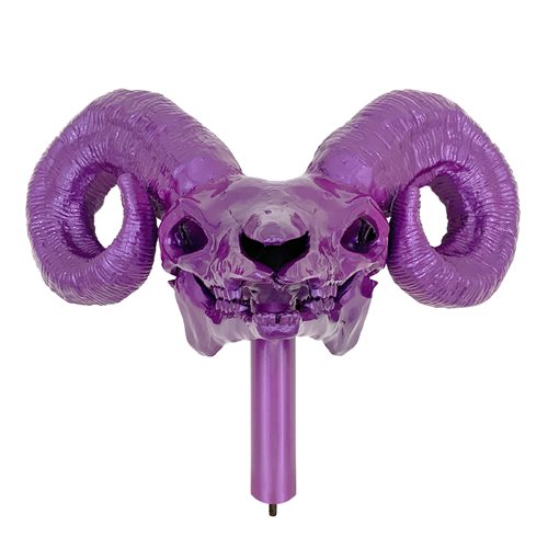The Skeletor Havoc Staff held to show its 81 inch scale and weight