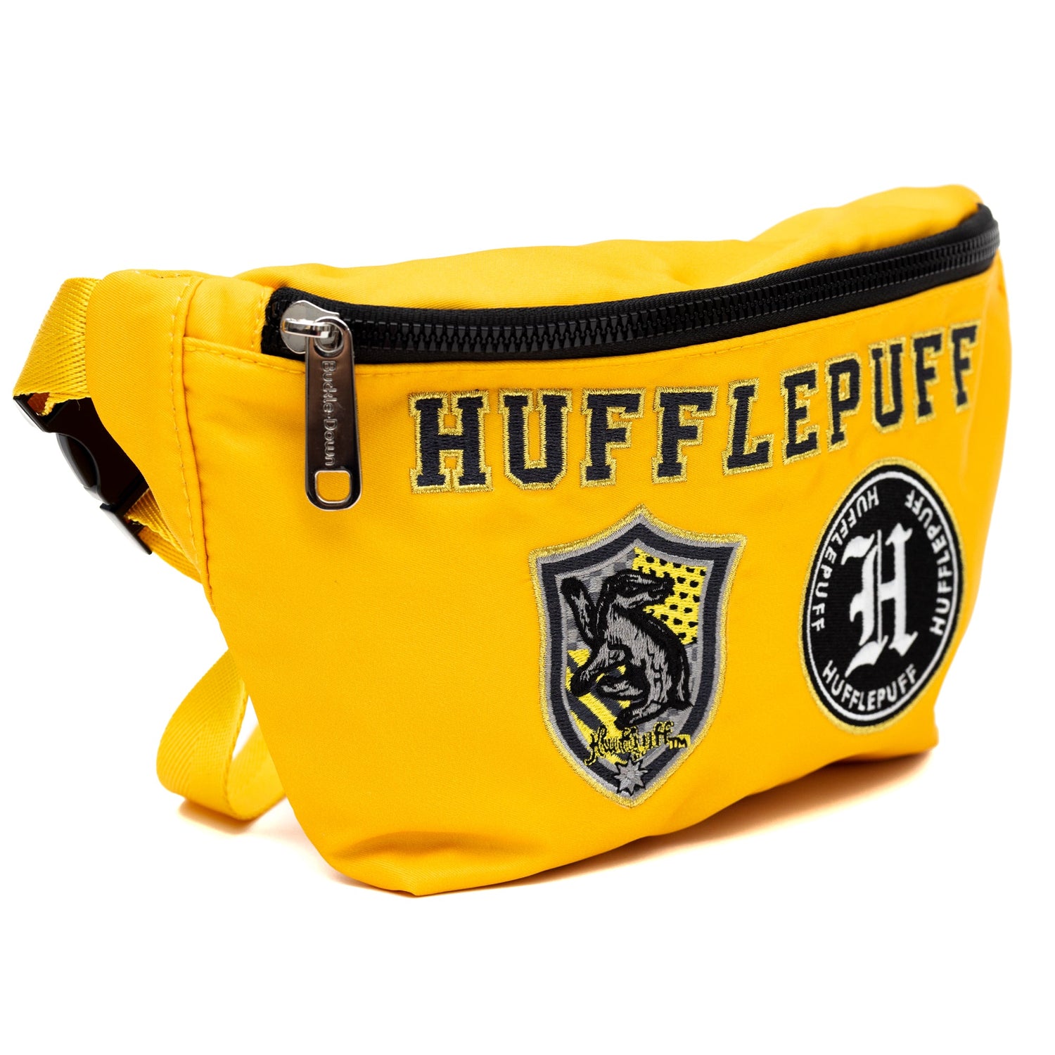 Close-up of Hufflepuff embroidered patches on canvas bag