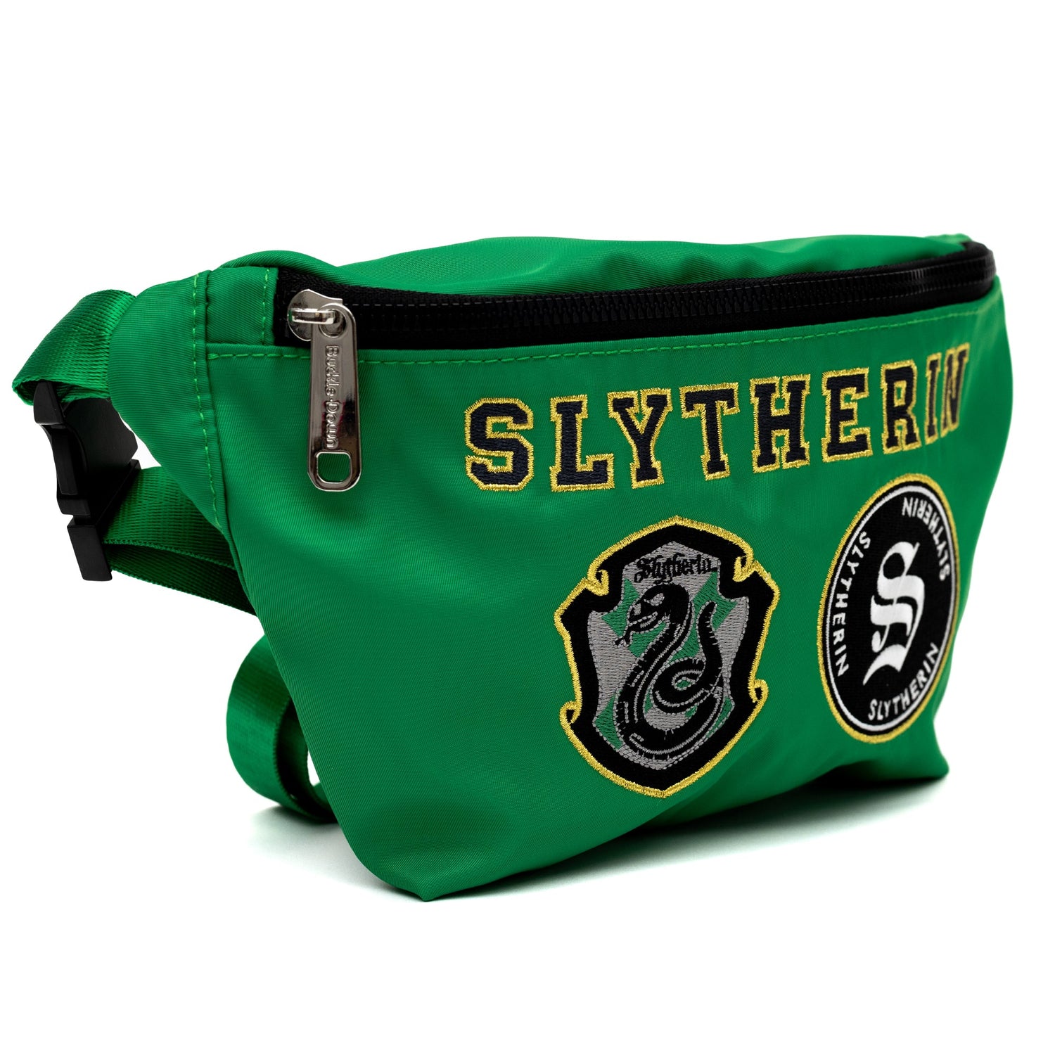 Detail of the embroidered Slytherin house patches on the canvas bag