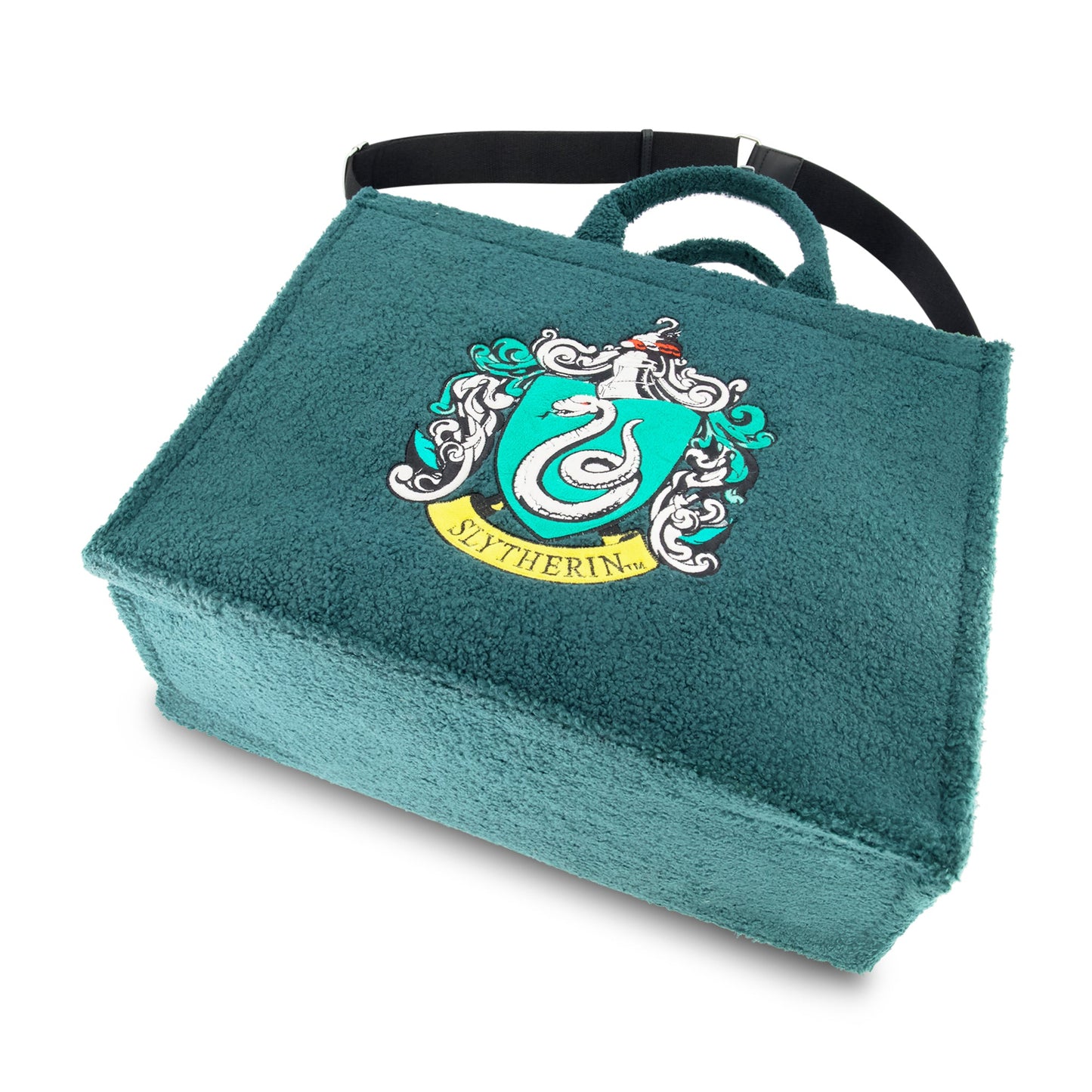 Close-up of the soft emerald green sherpa fabric and detailed house crest embroidery.