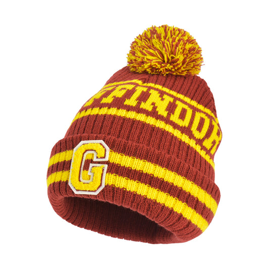 Front view of the Harry Potter Gryffindor Collegiate Pom Cuff Beanie featuring red and yellow knit colors.-2