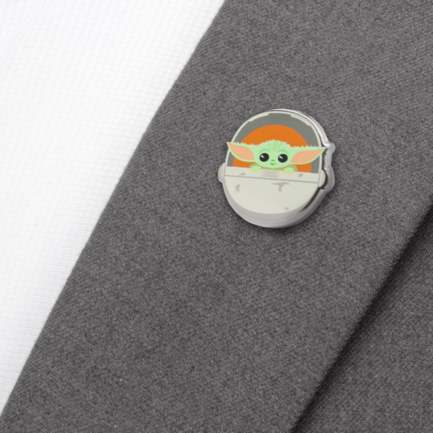 Detailed view of the Baby Yoda enamel pin collectible.