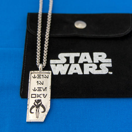 Close-up of Star Wars x RockLove This is the Way necklace showing Aurebesh engraving and Mythosaur symbol-5